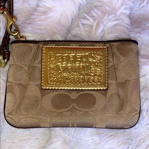 COACH SIGNATURE POPPY WRISTLET